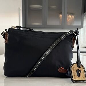 Dooney & Bourke Black Nylon Crossbody with Leather Trim and Gold Hardware.